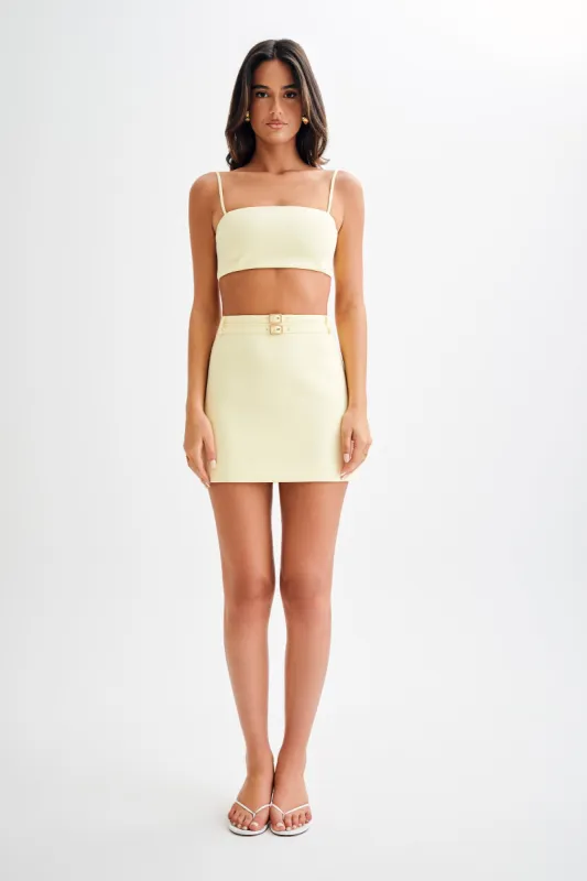 Letitia Suiting Mini Skirt With Buckle - Pastel Lemon sold by Meshki