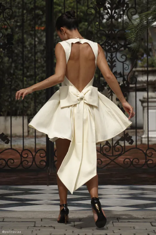 Marcella Linen Bow Back Mini Dress - Lemon Sherbet sold by Meshki