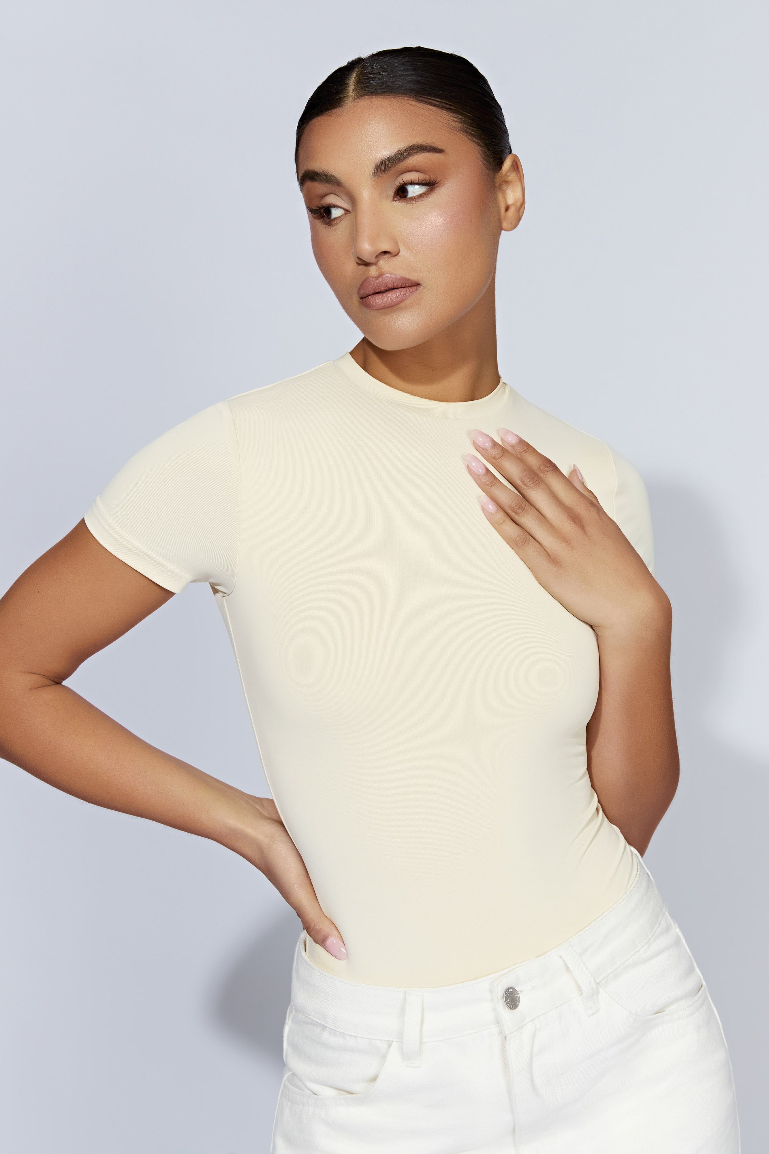 Francesca Crew Neck Short Sleeve Bodysuit - Cream sold by Meshki