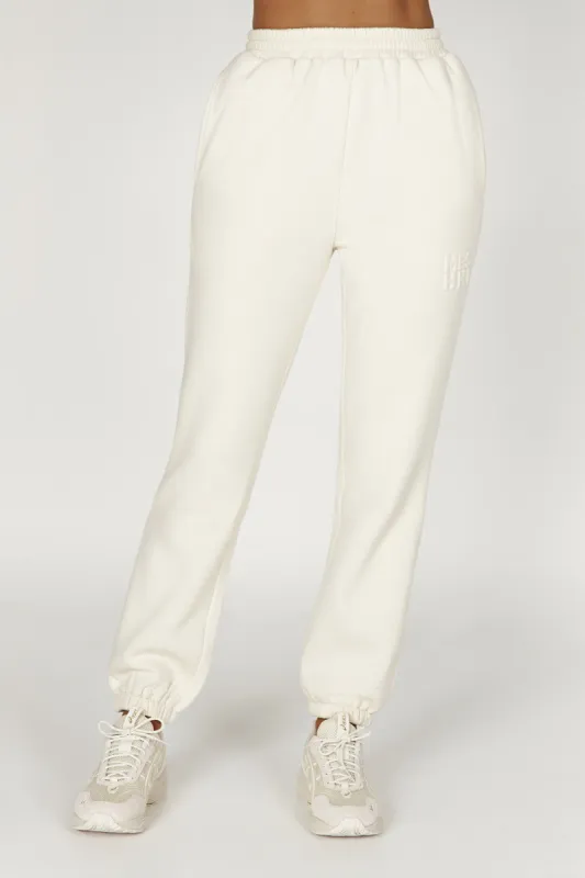 Emery Embossed Fleeceback Joggers - Bone sold by Meshki