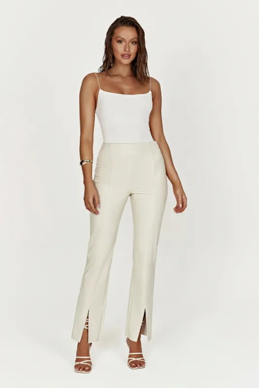 Vanessa Faux Leather Split Pant - Bone sold by Meshki