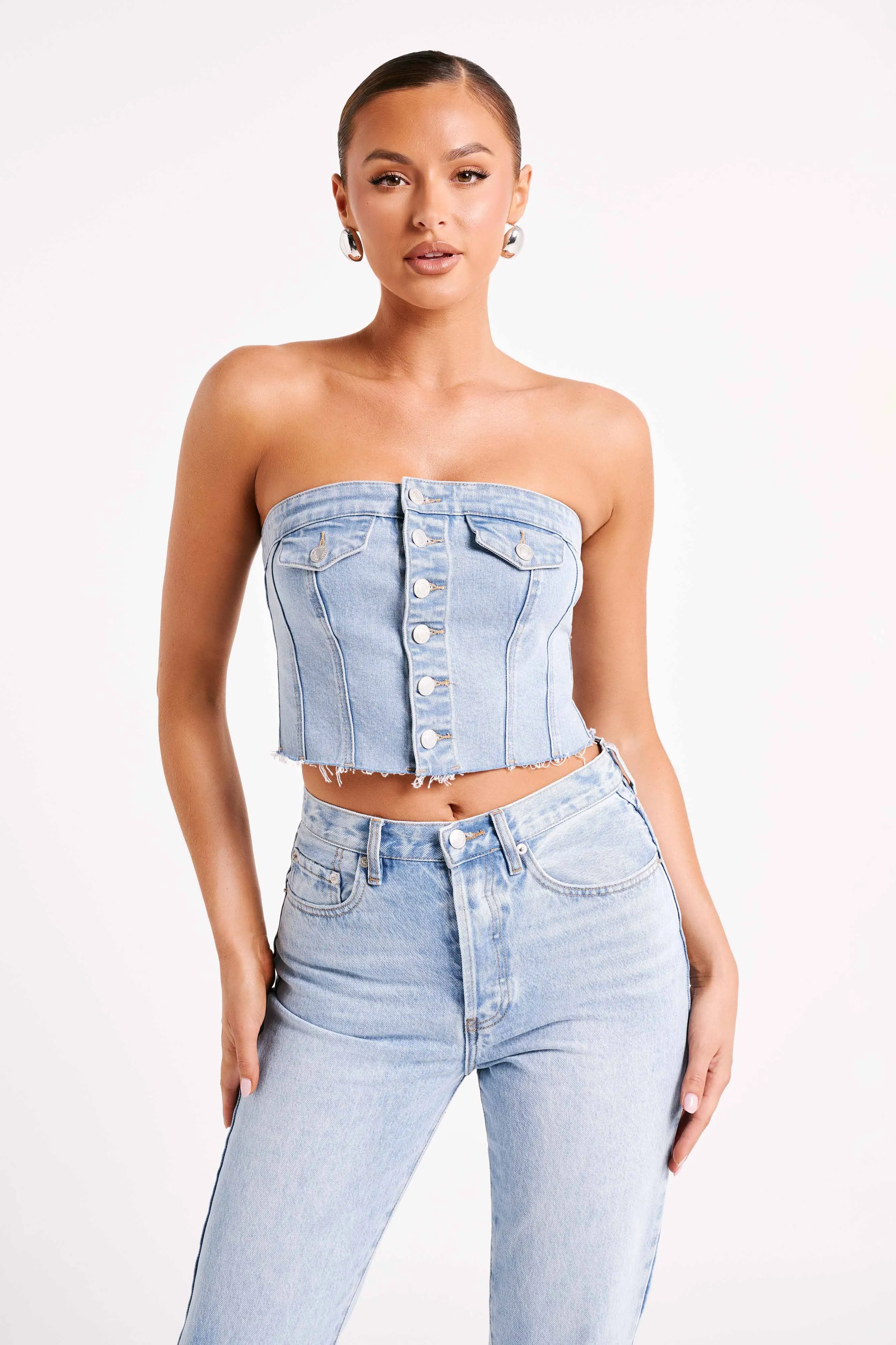 Sandy Buttoned Denim Tube Top - Mid Blue sold by Meshki