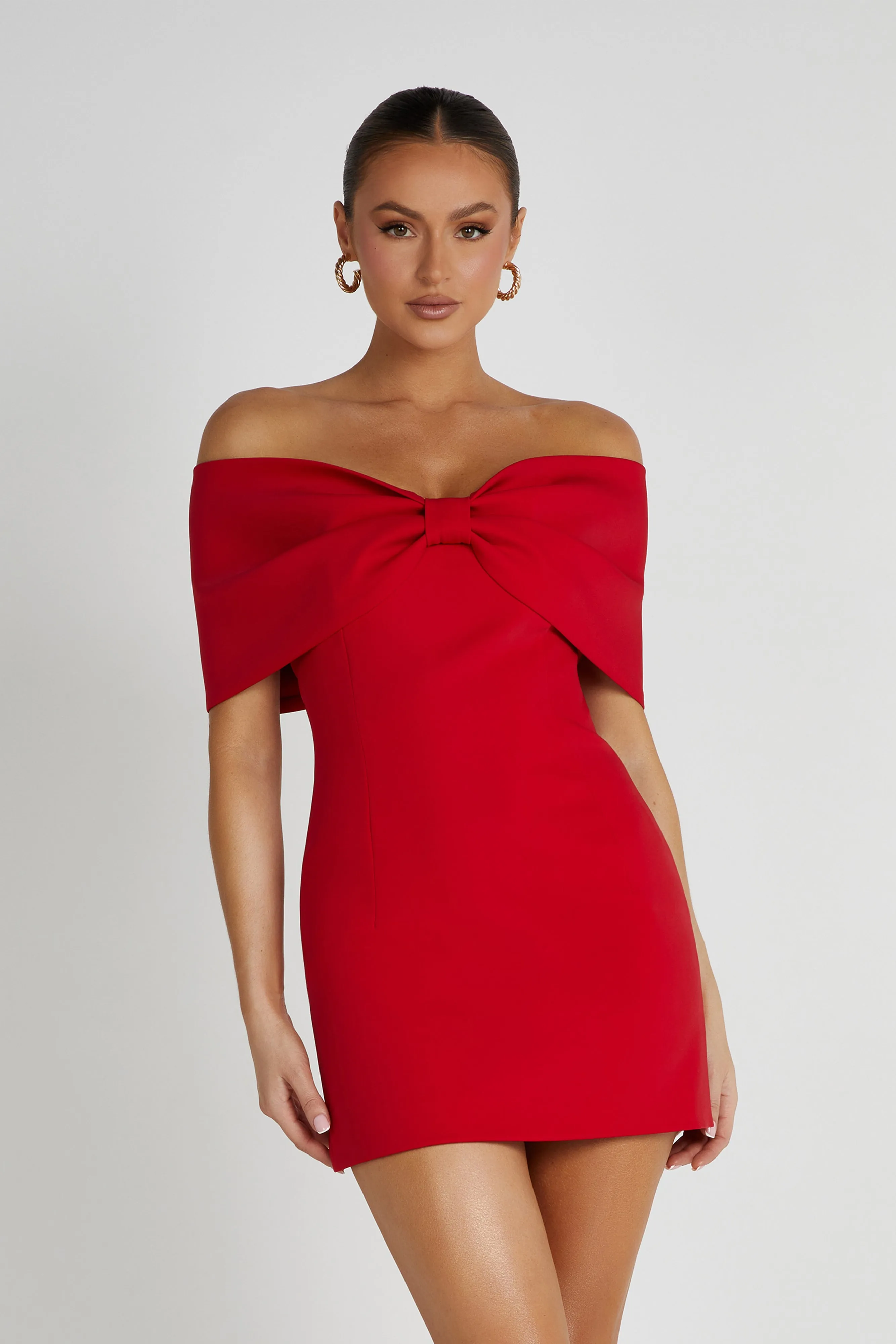 Gwyneth Off Shoulder Bow Mini Dress - Red sold by Meshki