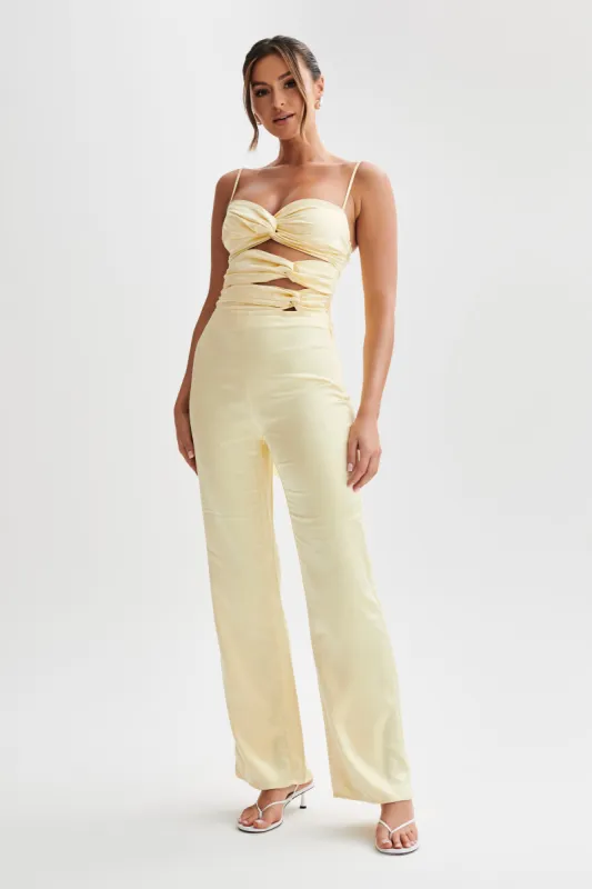 Elina Twist Satin Jumpsuit - Butter sold by Meshki