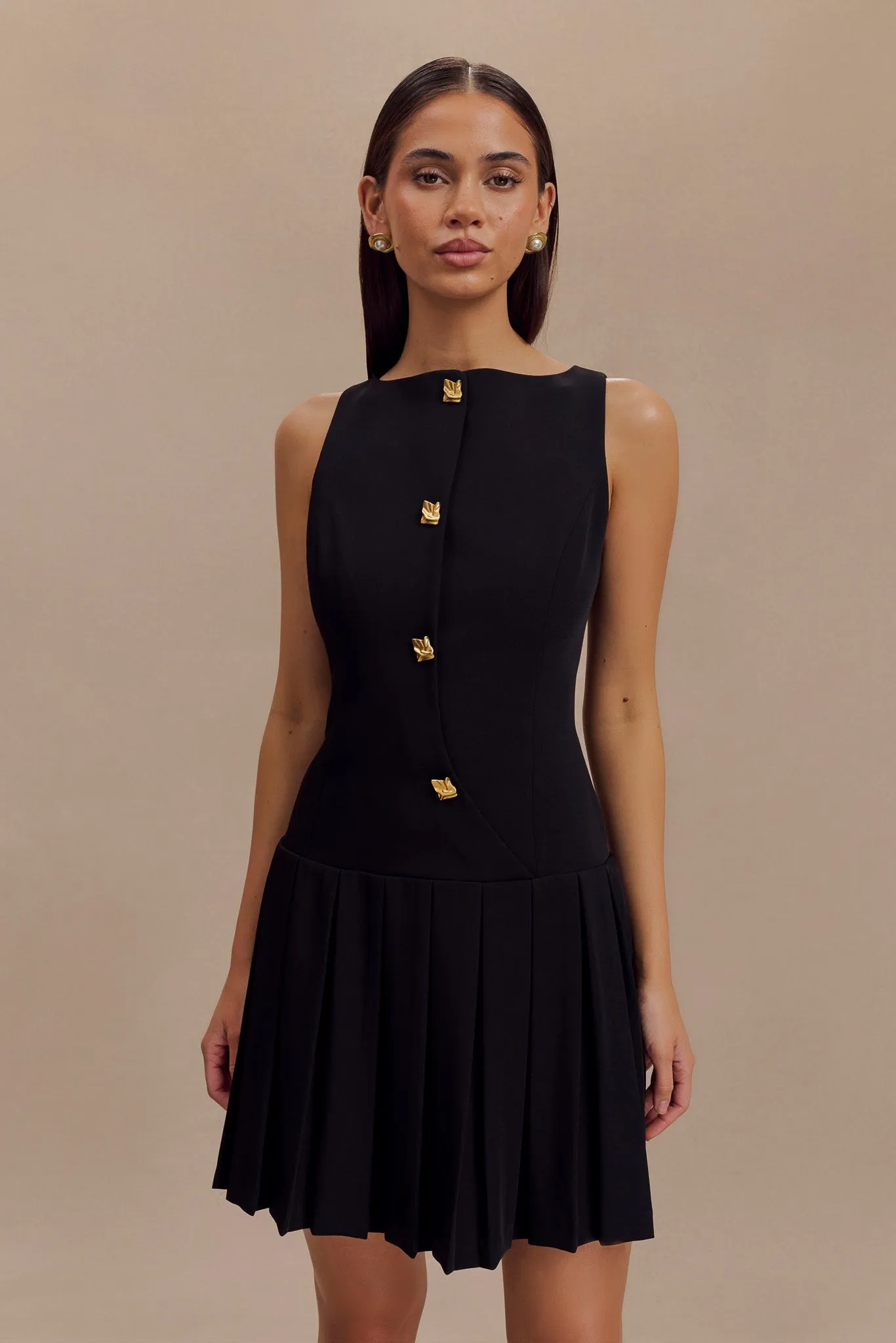 Mackenzie Sleeveless Pleated Mini Dress - Black sold by Meshki