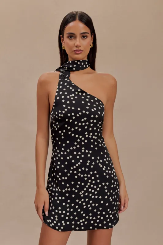 Joan Satin Asymmetrical Mini Dress - Black Polka Dot Print sold by Meshki