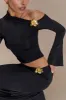Ainsley Asymmetrical Long Sleeve Top With Floral Hardware - Black sold by Meshki