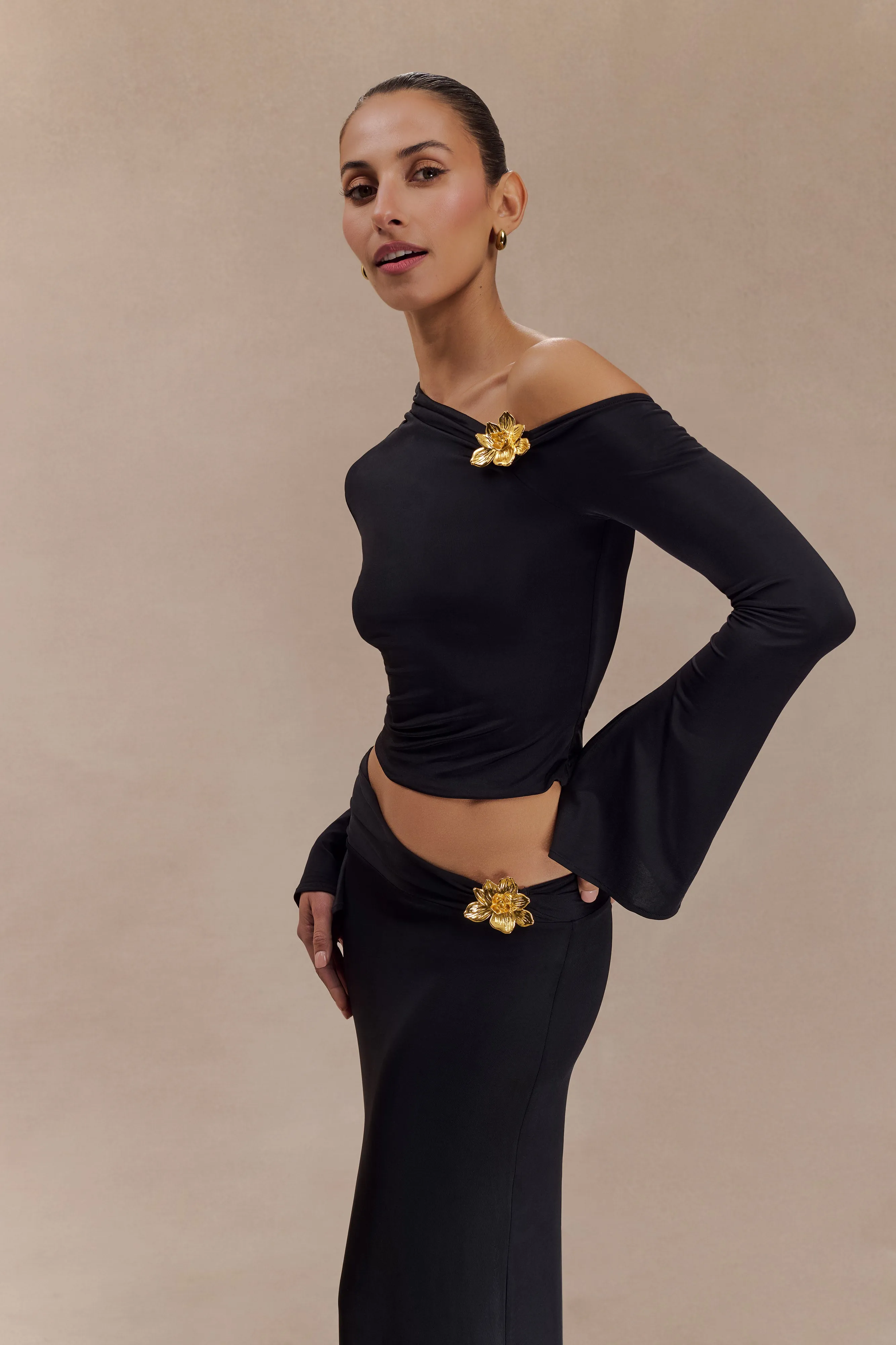 Ainsley Asymmetrical Long Sleeve Top With Floral Hardware - Black sold by Meshki product image thumbnail 5