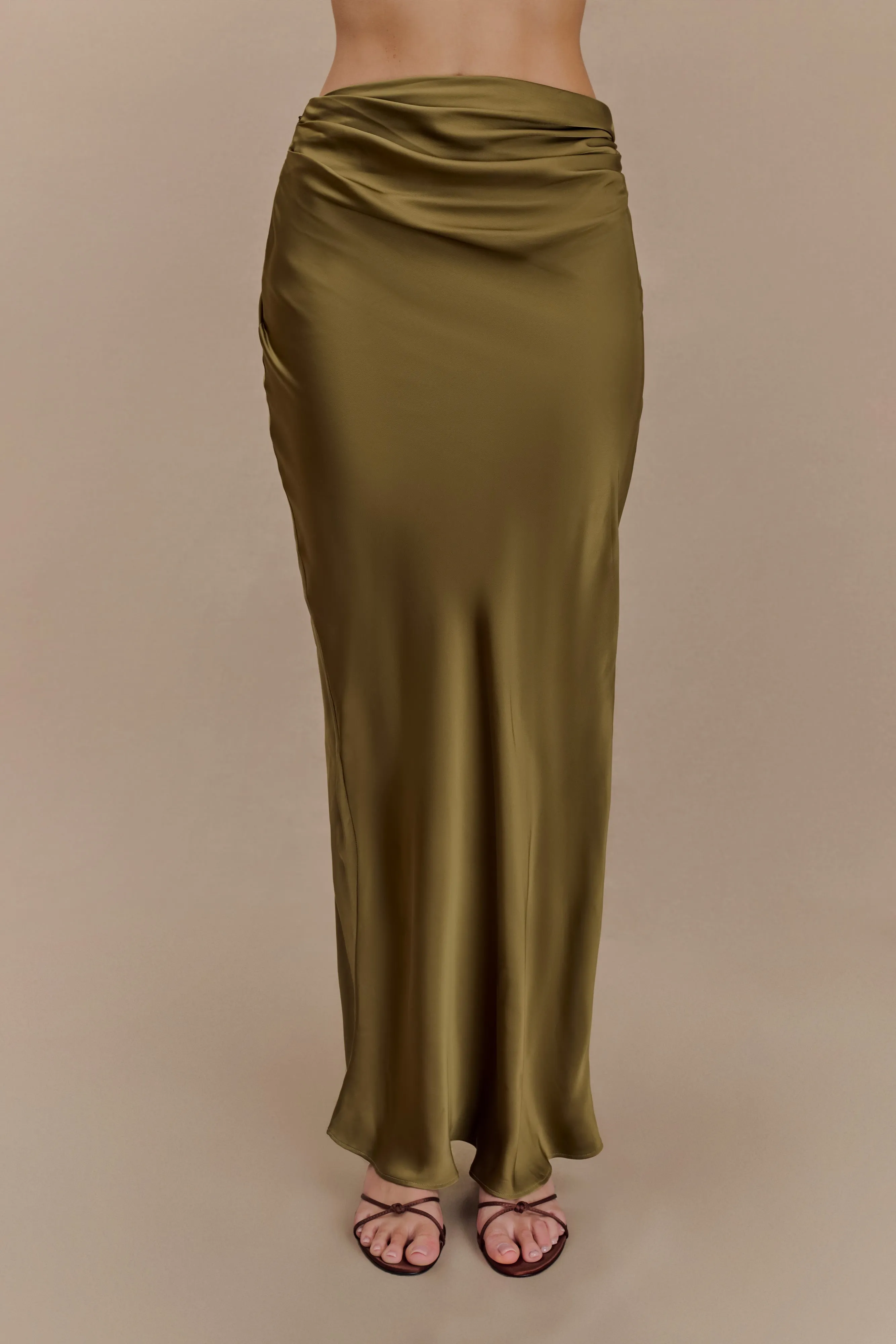 Nicola Satin Asymmetric Maxi Skirt - Basil sold by Meshki