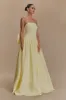 Frances Strapless Bow Maxi Dress - Lemon sold by Meshki