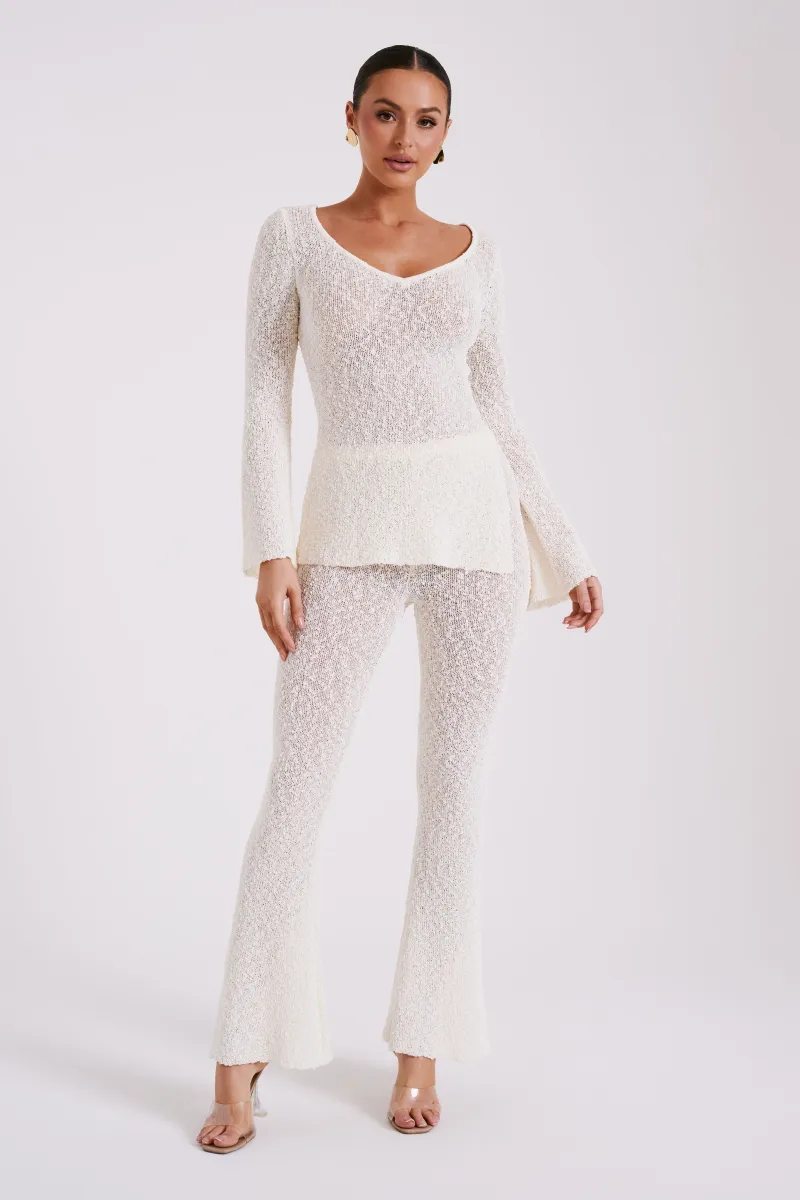 Irma Flared Boucle Pants - Cream sold by Meshki