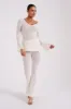 Irma Flared Boucle Pants - Cream sold by Meshki