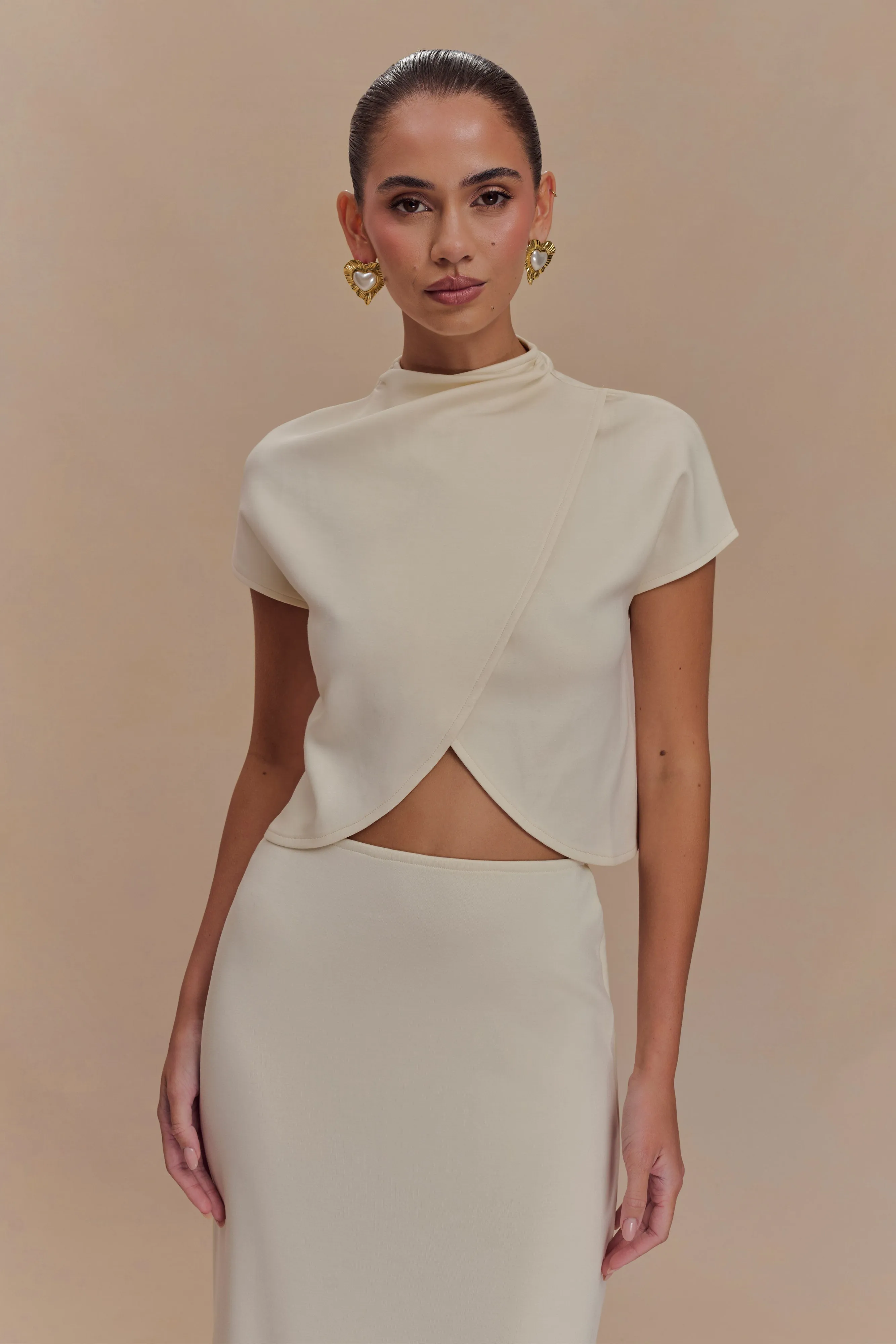 Eris High Neck Scuba Jersey Top - Ivory sold by Meshki