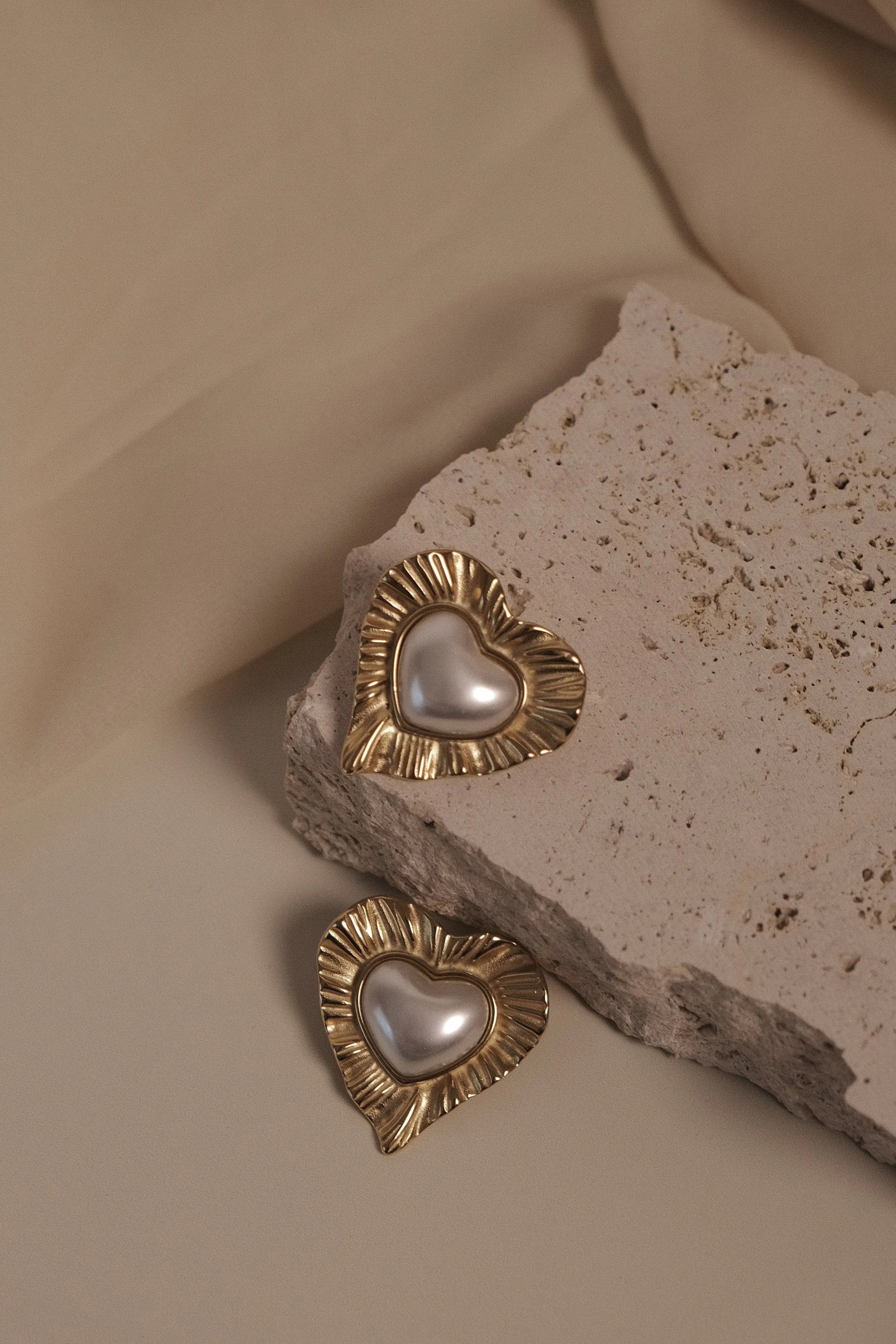 Heart To Heart Pearl Earrings - Gold sold by Meshki