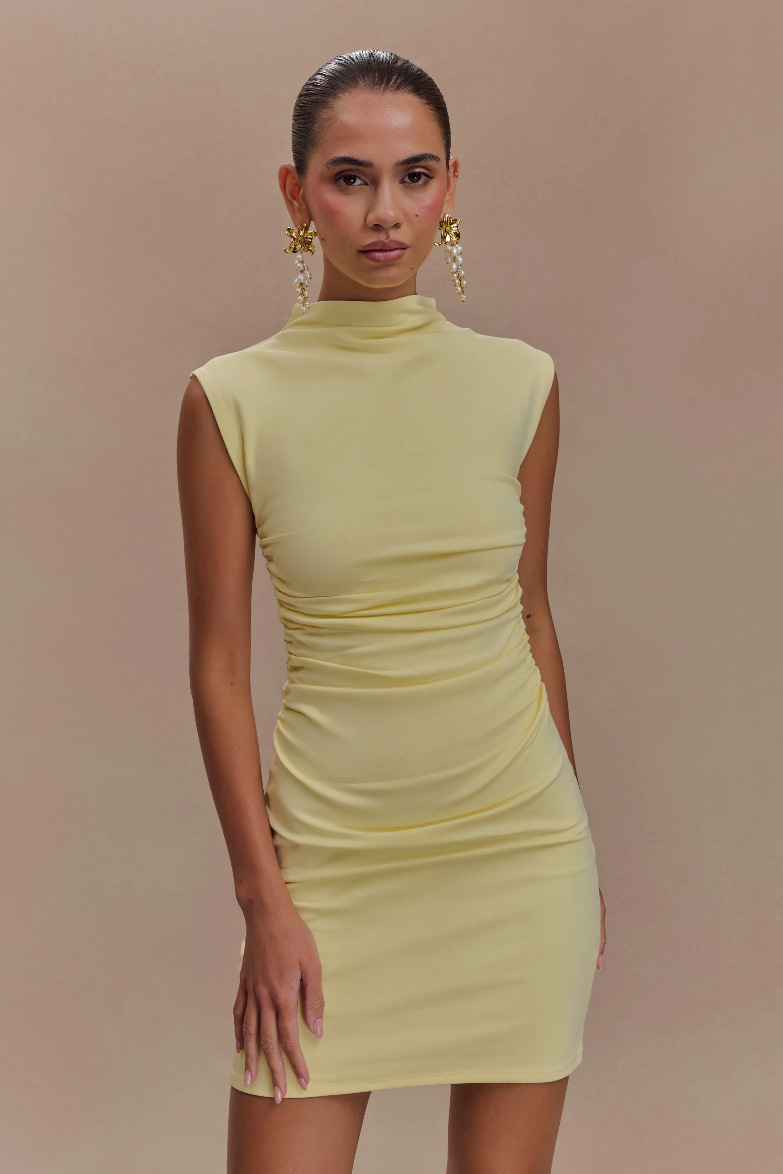 Elliot High Neck Sleeveless Mini Dress - Pale Lemon sold by Meshki