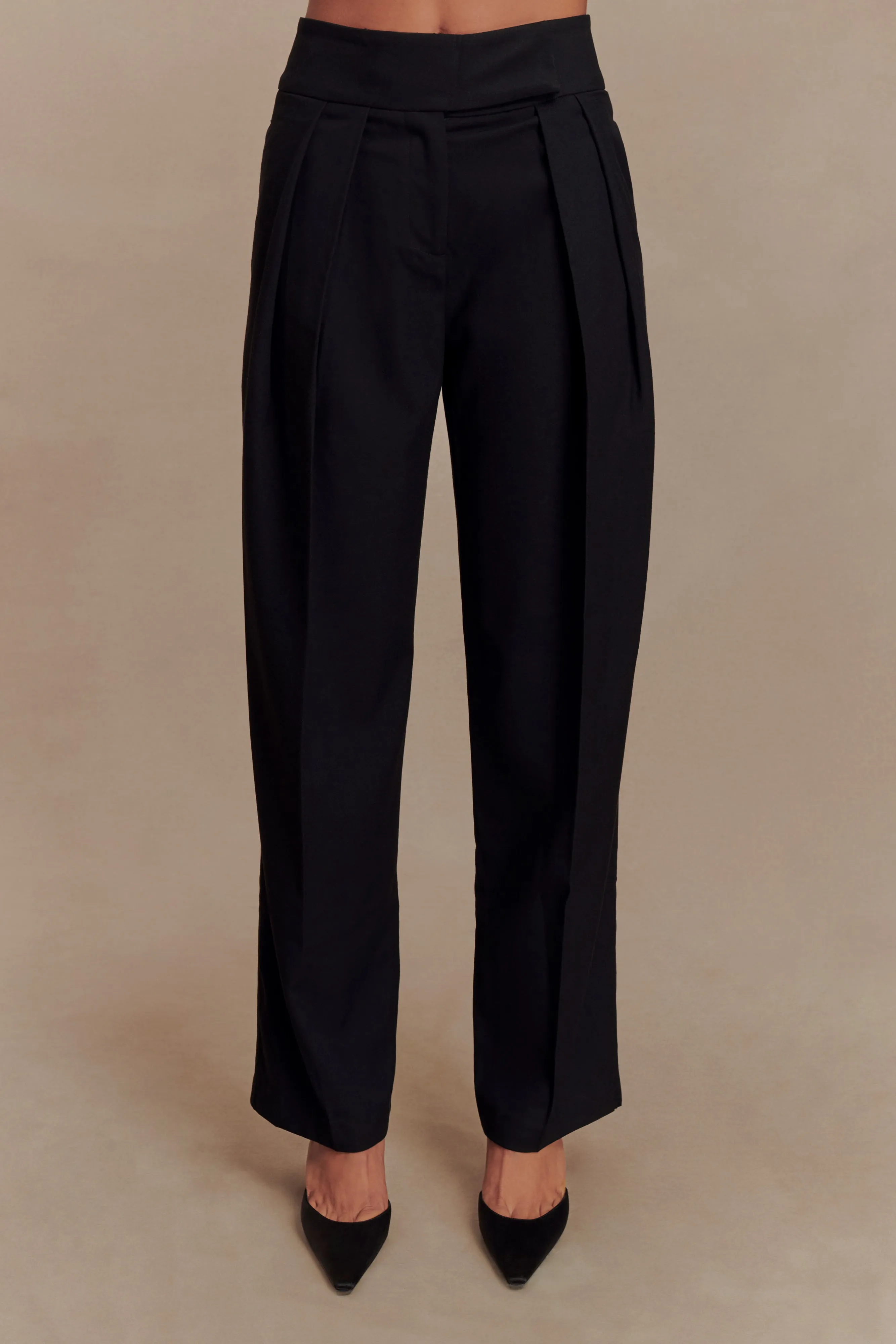 Penelope Pleated High Waisted Pants - Black sold by Meshki