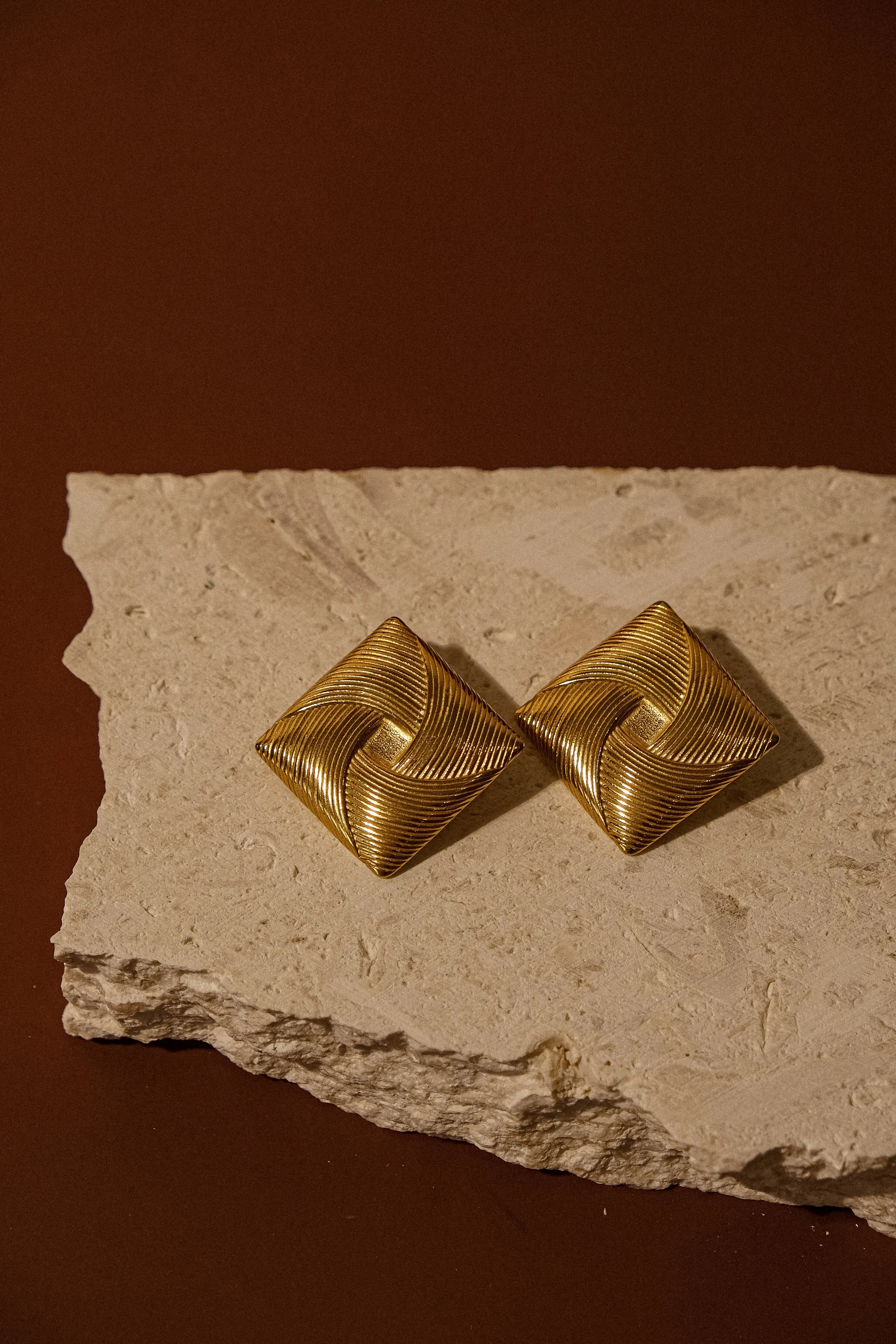 Indira Twisted Square Earrings - Gold sold by Meshki