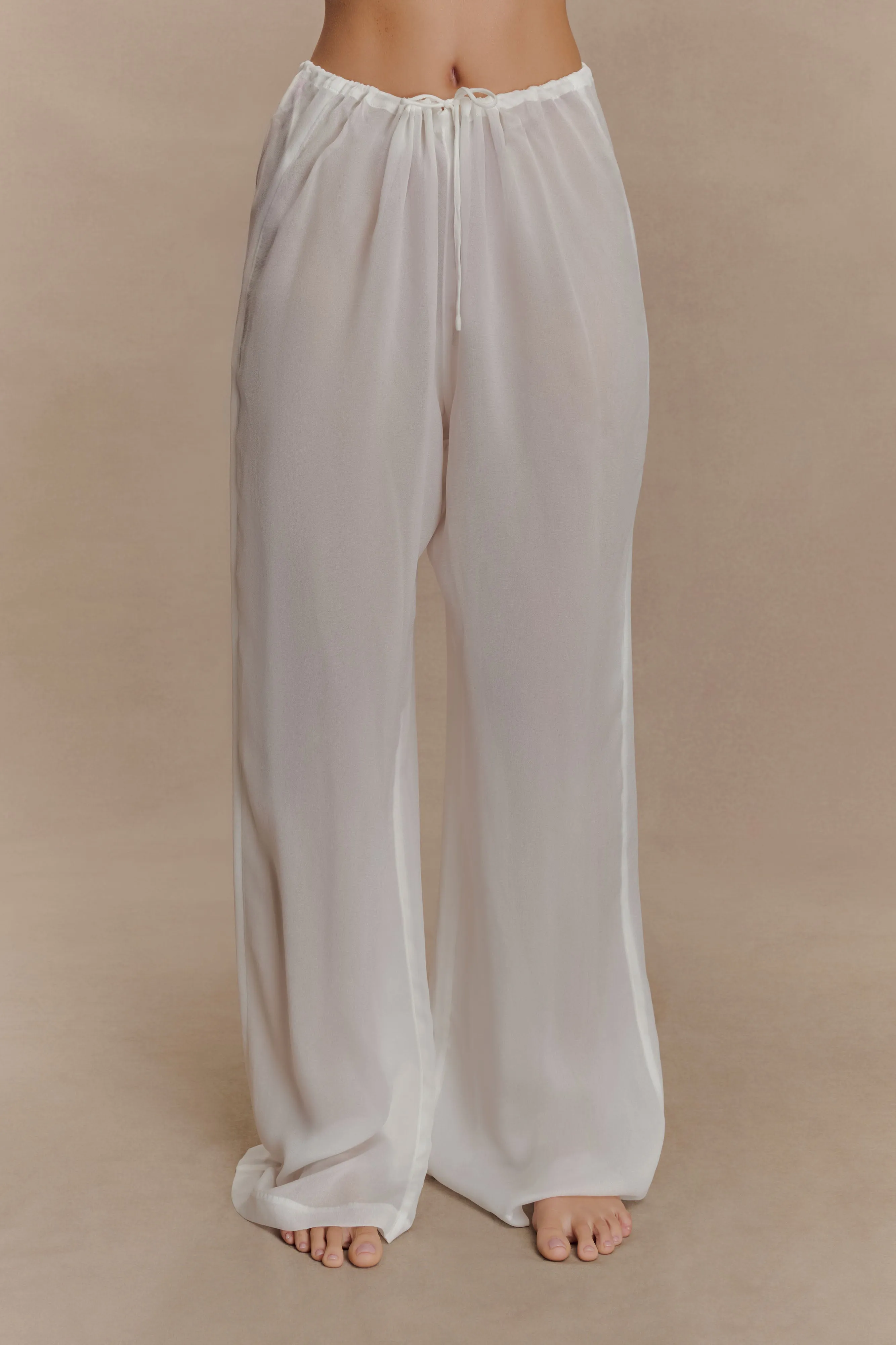 Tonya Sheer Straight Leg Pant - Ivory sold by Meshki