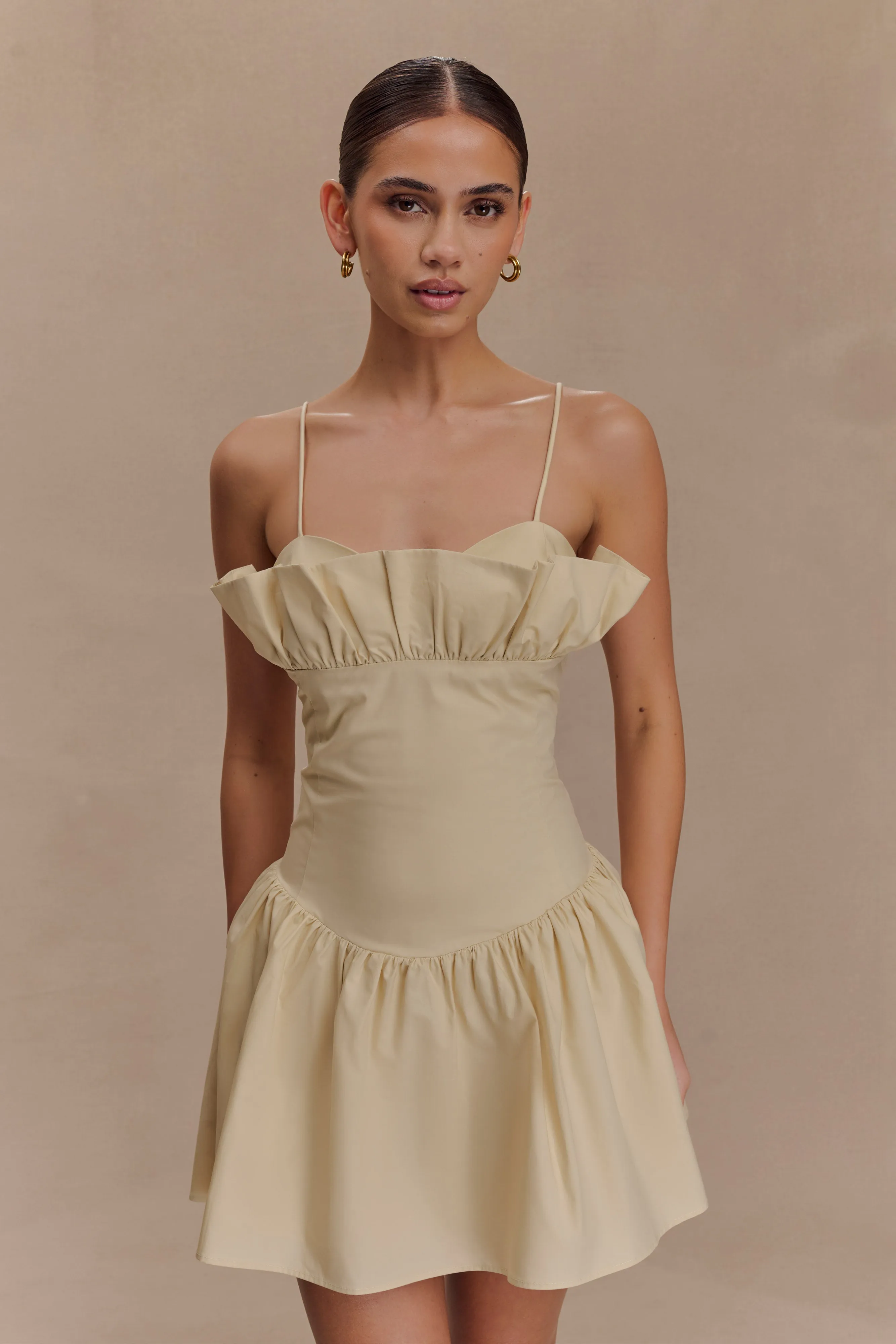 Janis Cotton Frill Mini Dress - Nude sold by Meshki