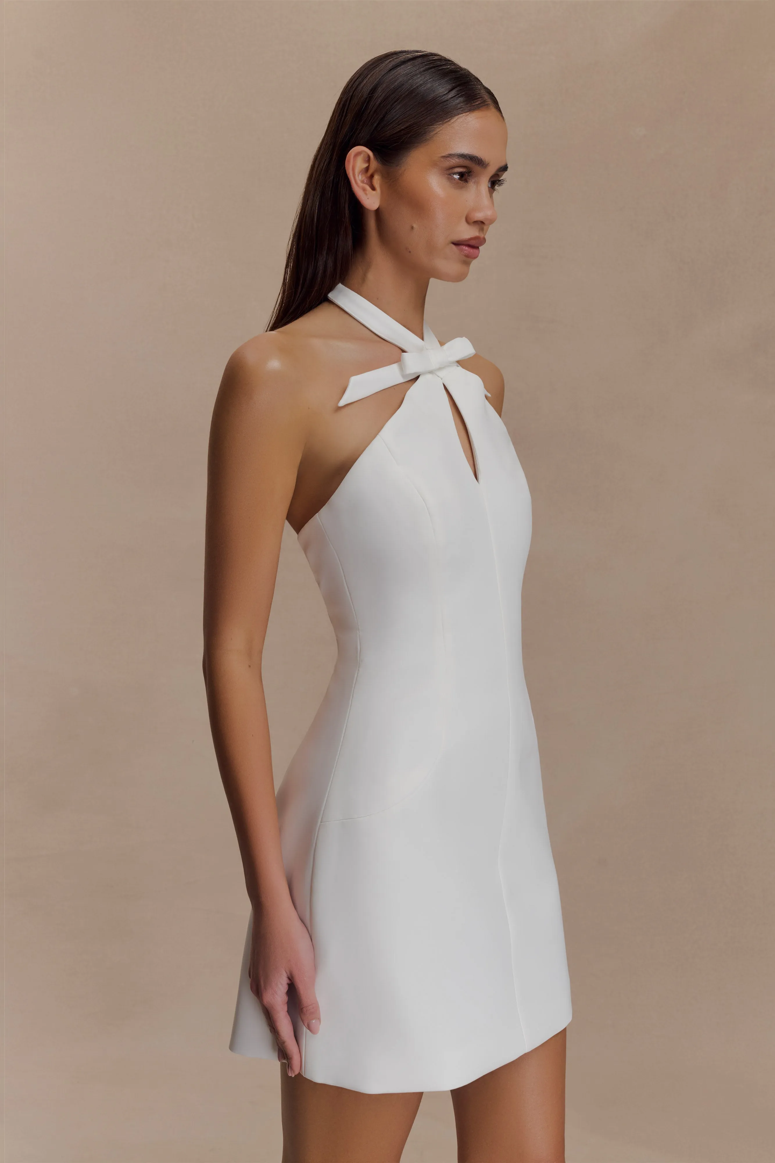 Freya Halter Bow Mini Dress - Ivory sold by Meshki product image thumbnail 3