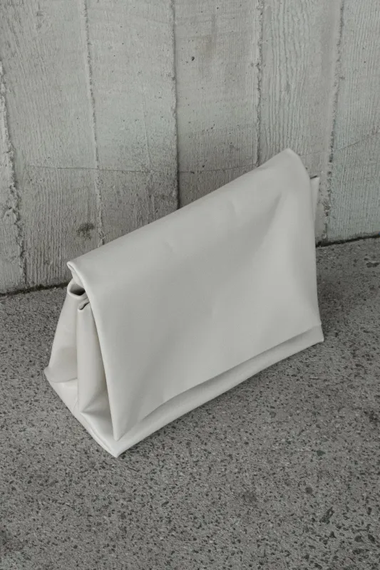 Kiera Faux Leather Oversized Clutch - Ivory sold by Meshki