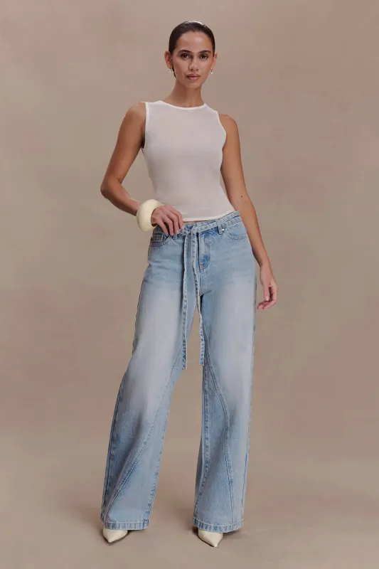 Perrie Mid Rise Straight Leg Tie Jeans - Washed Light Blue sold by Meshki