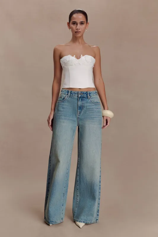 Romi Mid Rise Wide Leg Jeans - Faded Mid Blue sold by Meshki