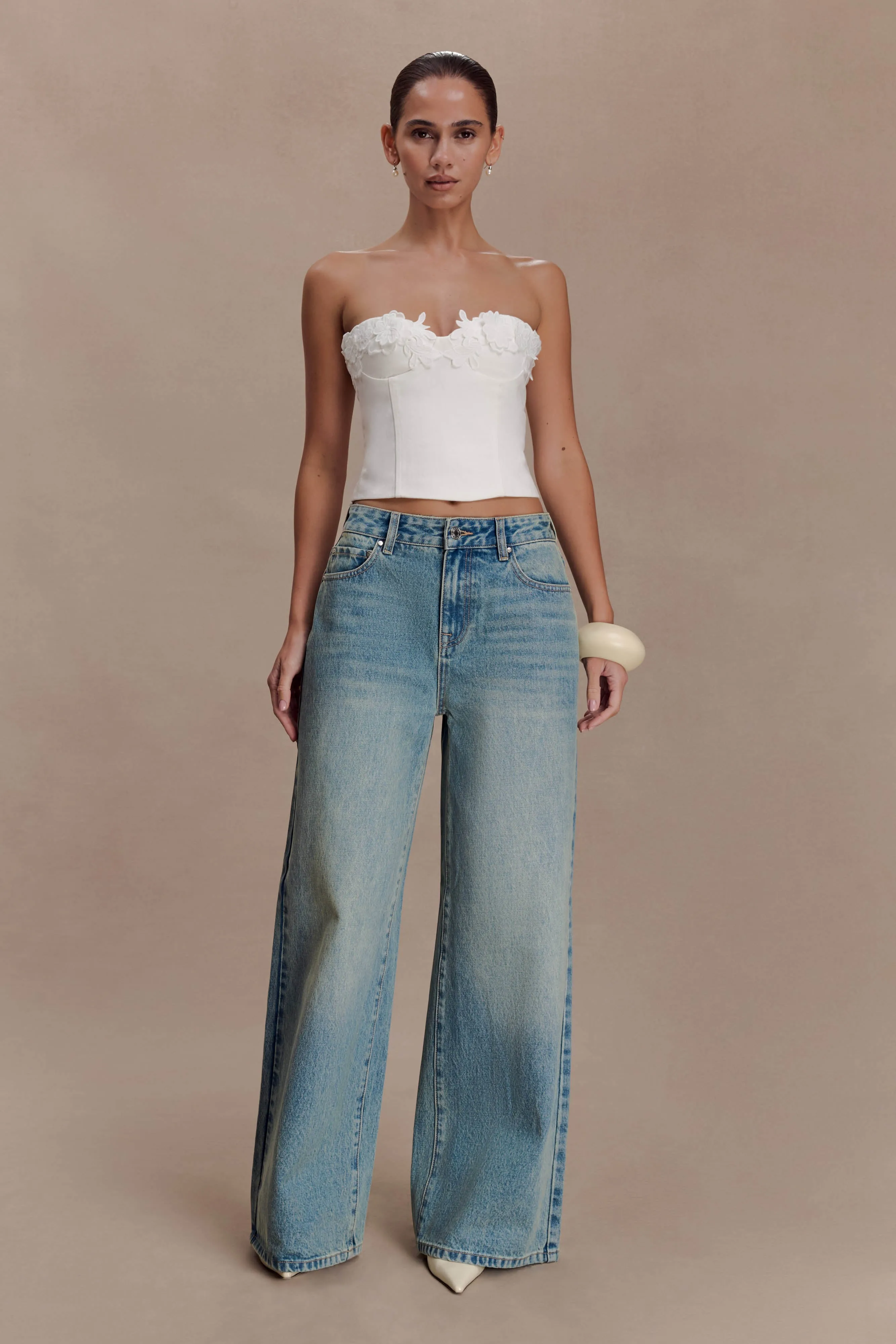 Romi Mid Rise Wide Leg Jeans - Faded Mid Blue sold by Meshki