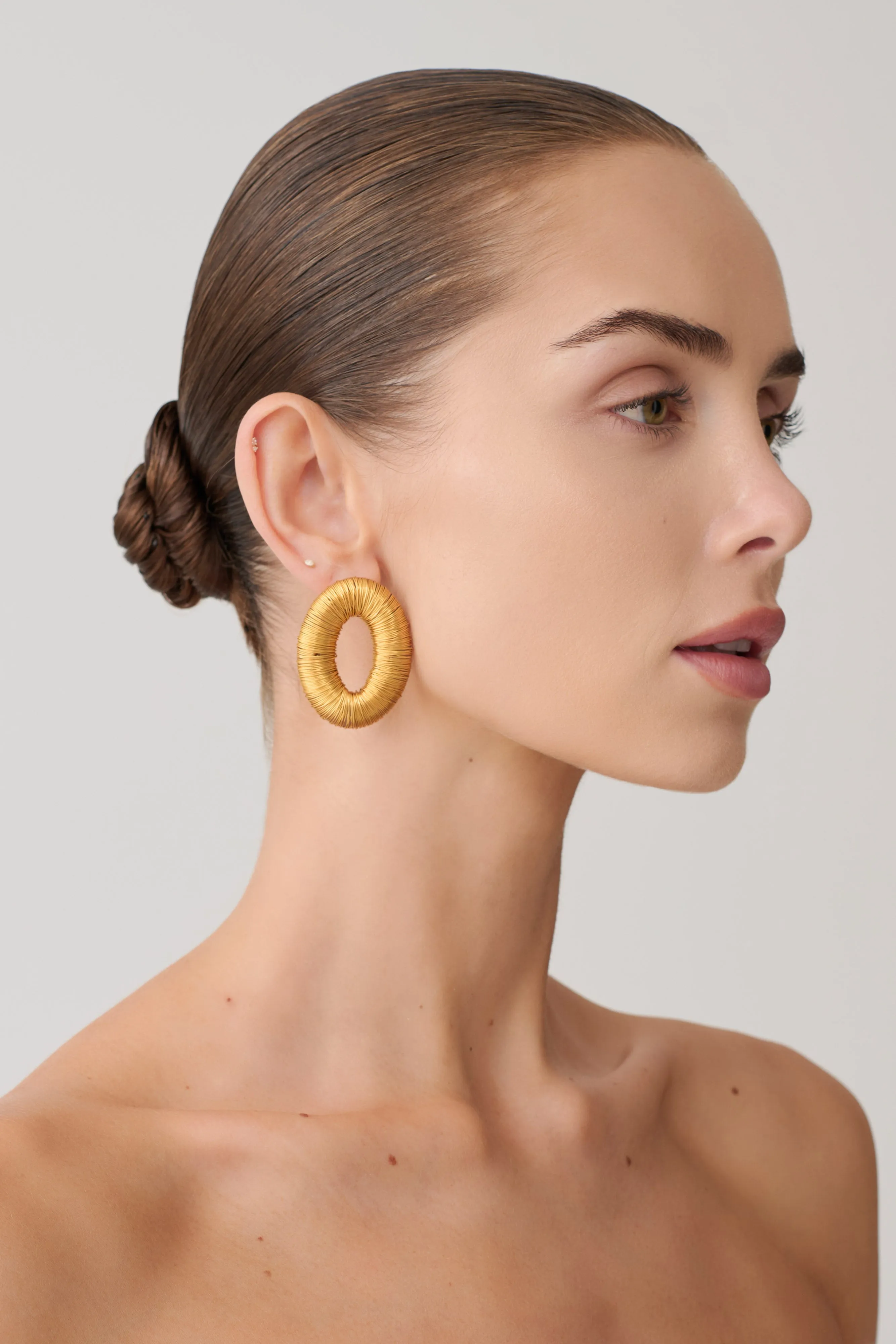 Yara Metal Wounded Stud Earring - Gold sold by Meshki