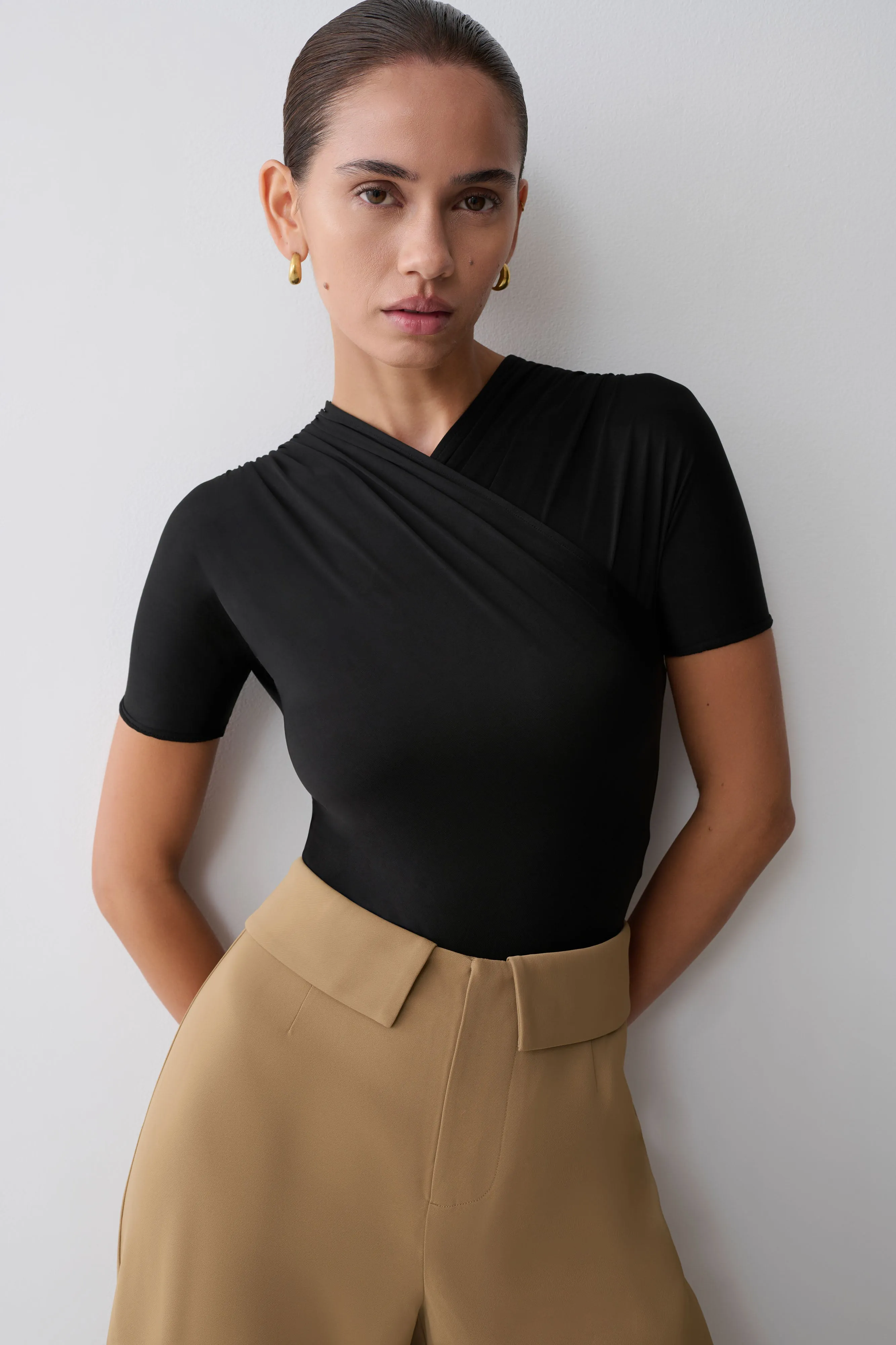 Junie Shortsleeve Cross-Over Bodysuit - Black sold by Meshki