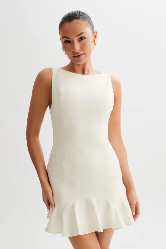 Leonora Sleeveless Suiting Mini Dress With Ruffle - Ivory sold by Meshki