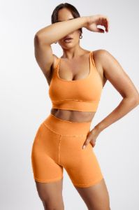 Carly Bike Shorts - Tangerine sold by Meshki