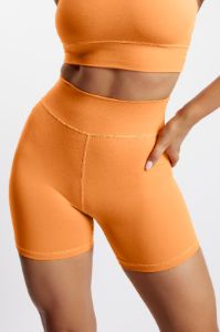 Carly Bike Shorts - Tangerine sold by Meshki