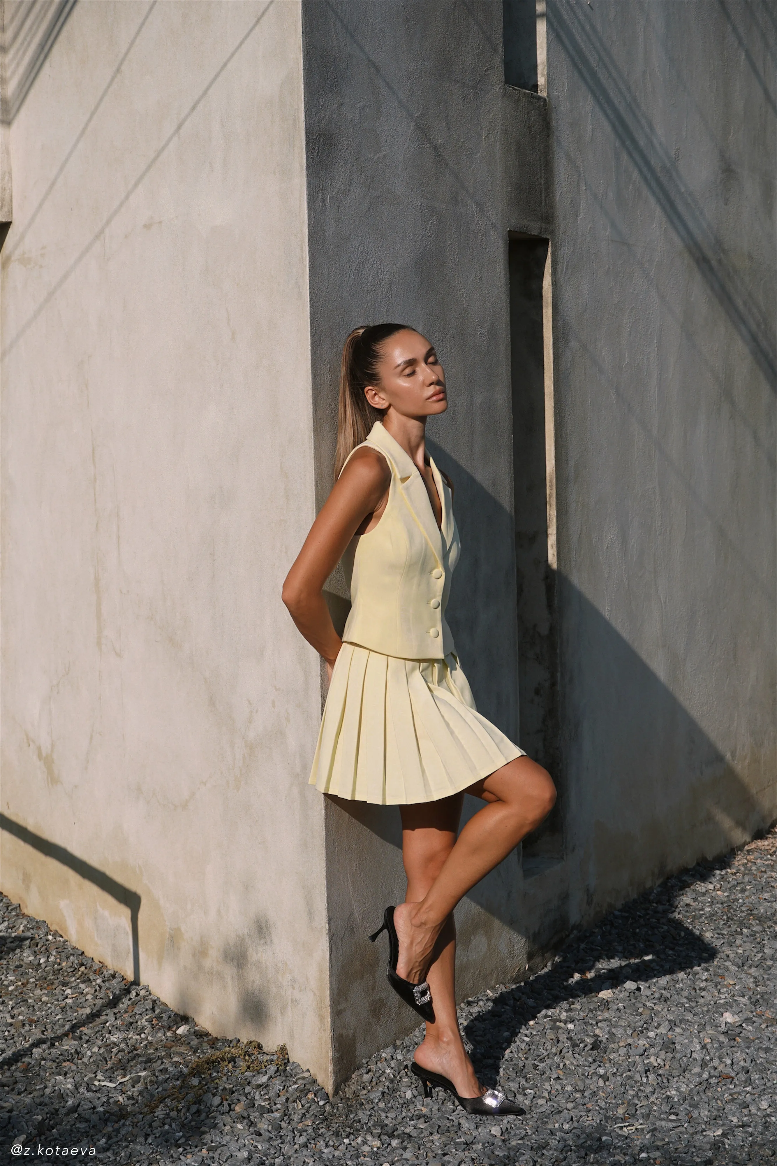 Mura Pleated Mini Skirt - Lemon sold by Meshki product image thumbnail 2