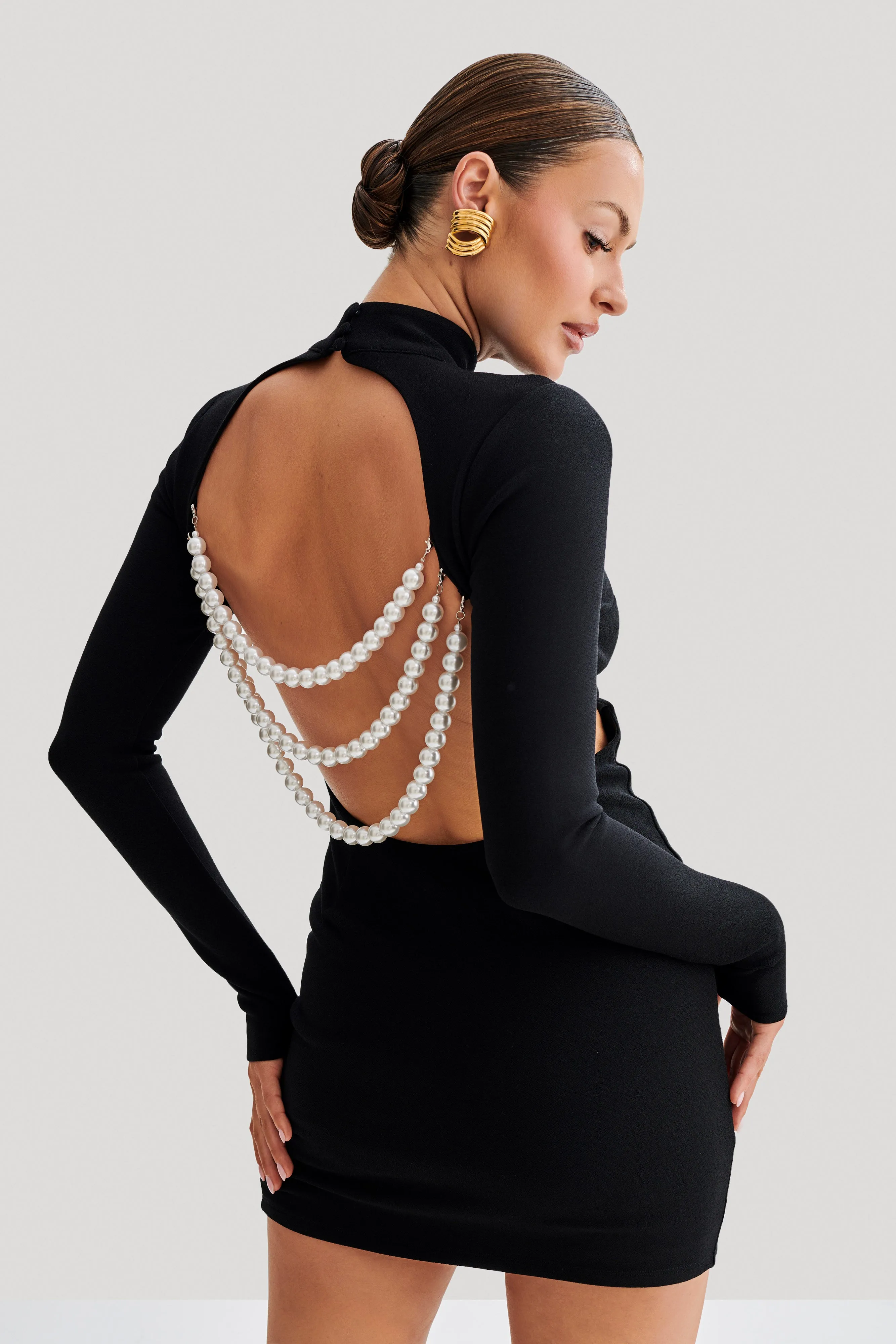 Agatha Crepe Pearl Mini Dress - Black sold by Meshki