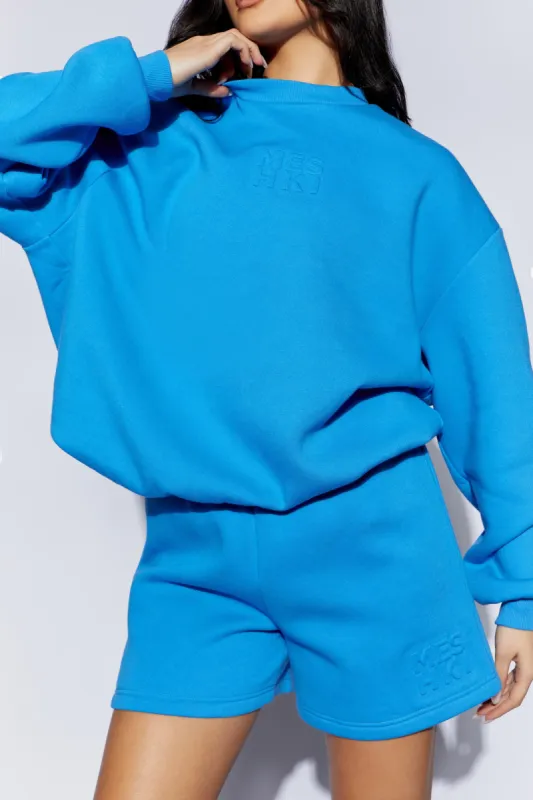 Sutton Embossed Fleeceback Crewneck - Blue sold by Meshki