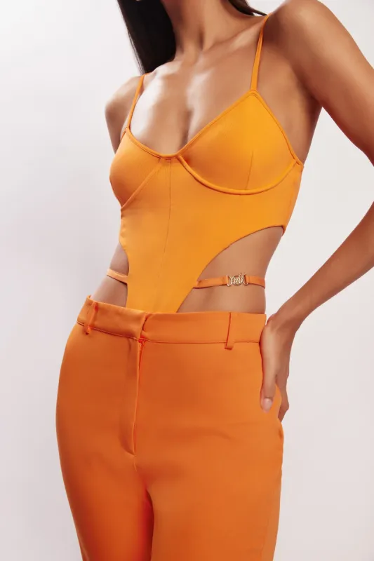 Steph Cut Out Bodysuit With Hardware - Tangerine sold by Meshki