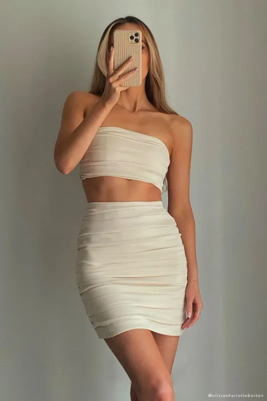 Lola Ruched Mini Skirt - Cream sold by Meshki