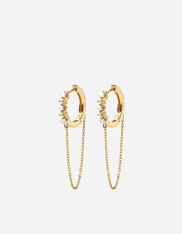 Calista Huggie Pearl Earrings, 14k Gold Pavé sold by Miansai