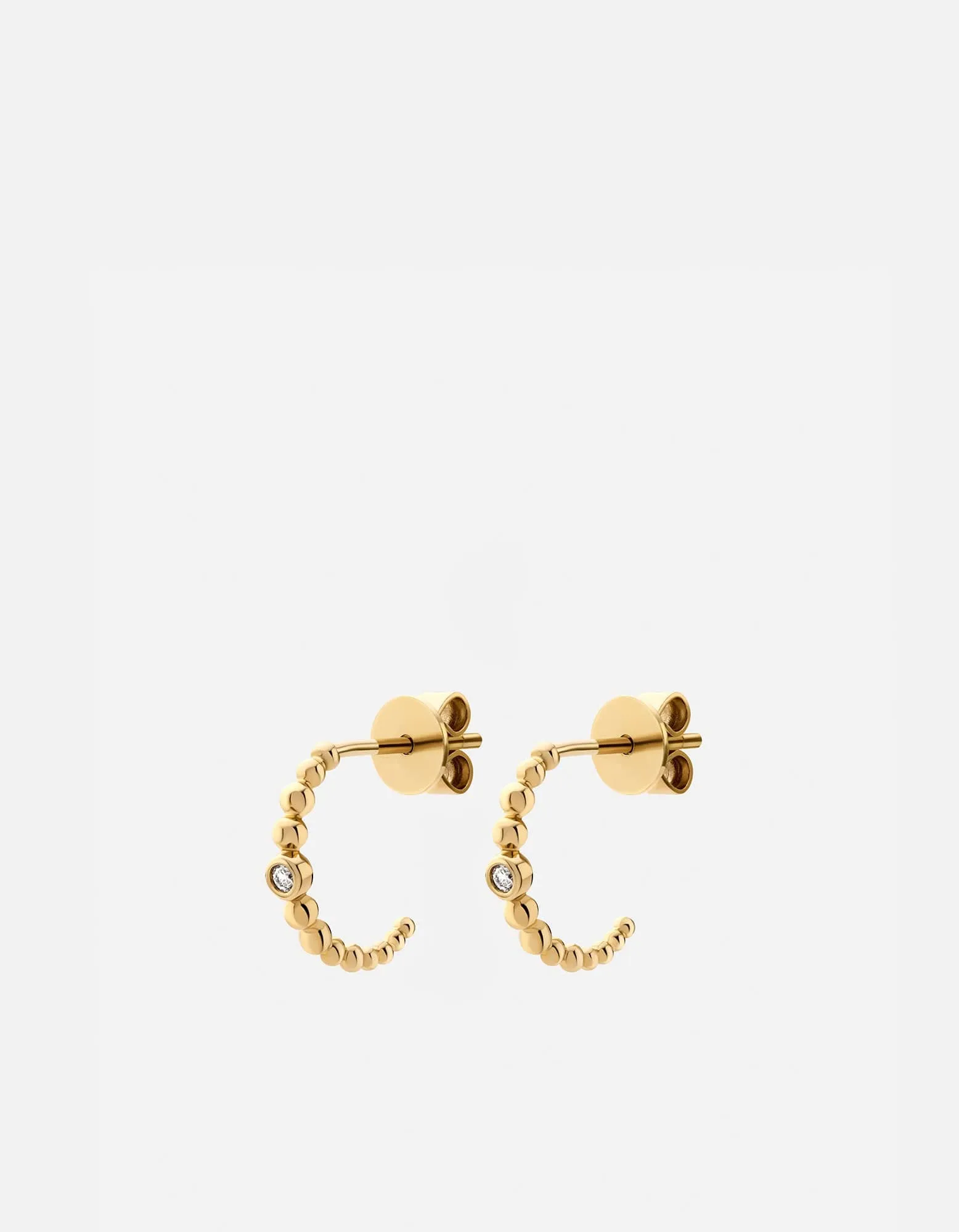 Ida Huggie Earrings, 14k Gold Pavé sold by Miansai