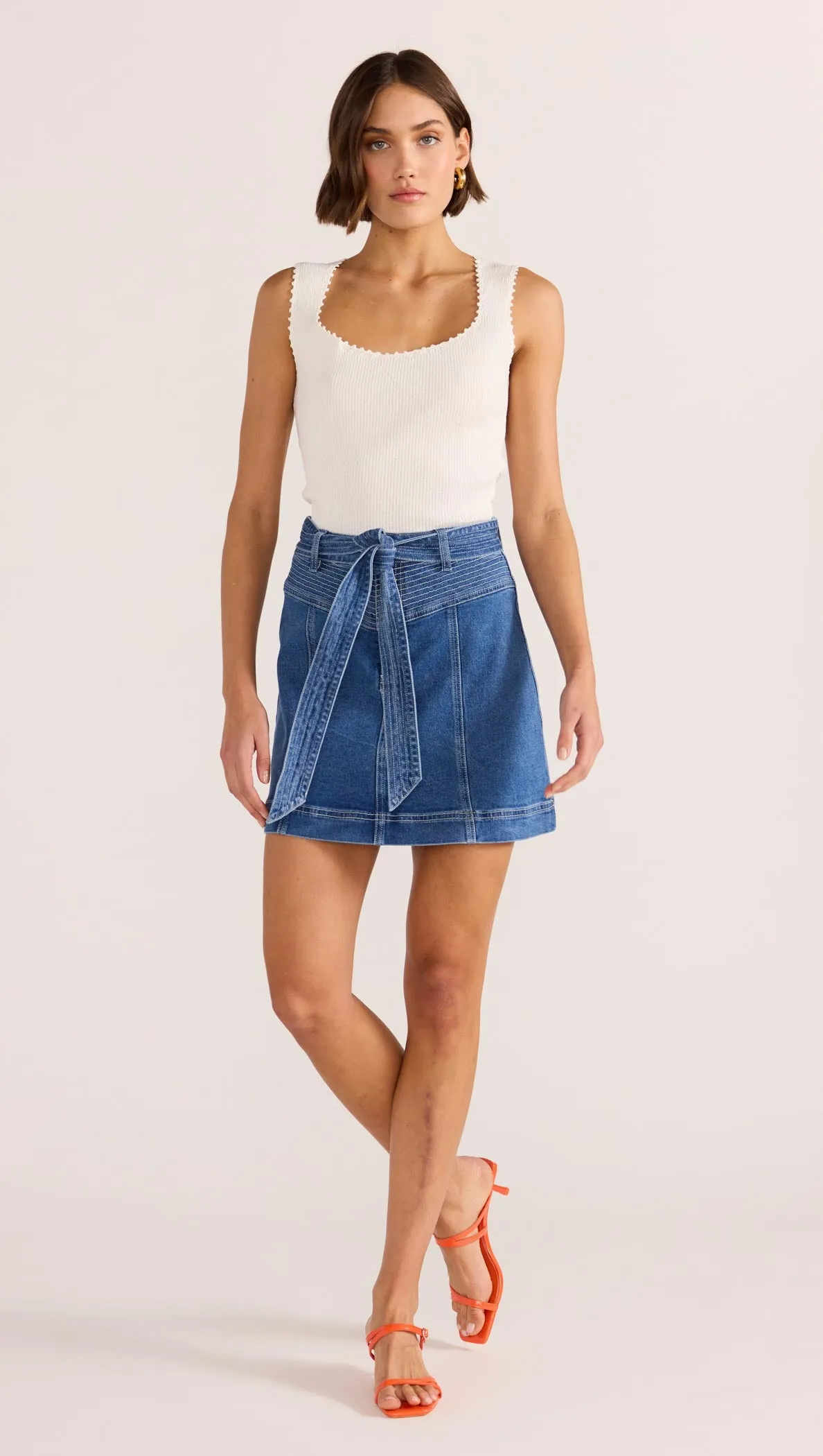 Ellis Denim Panel Mini Skirt sold by MINKPINK