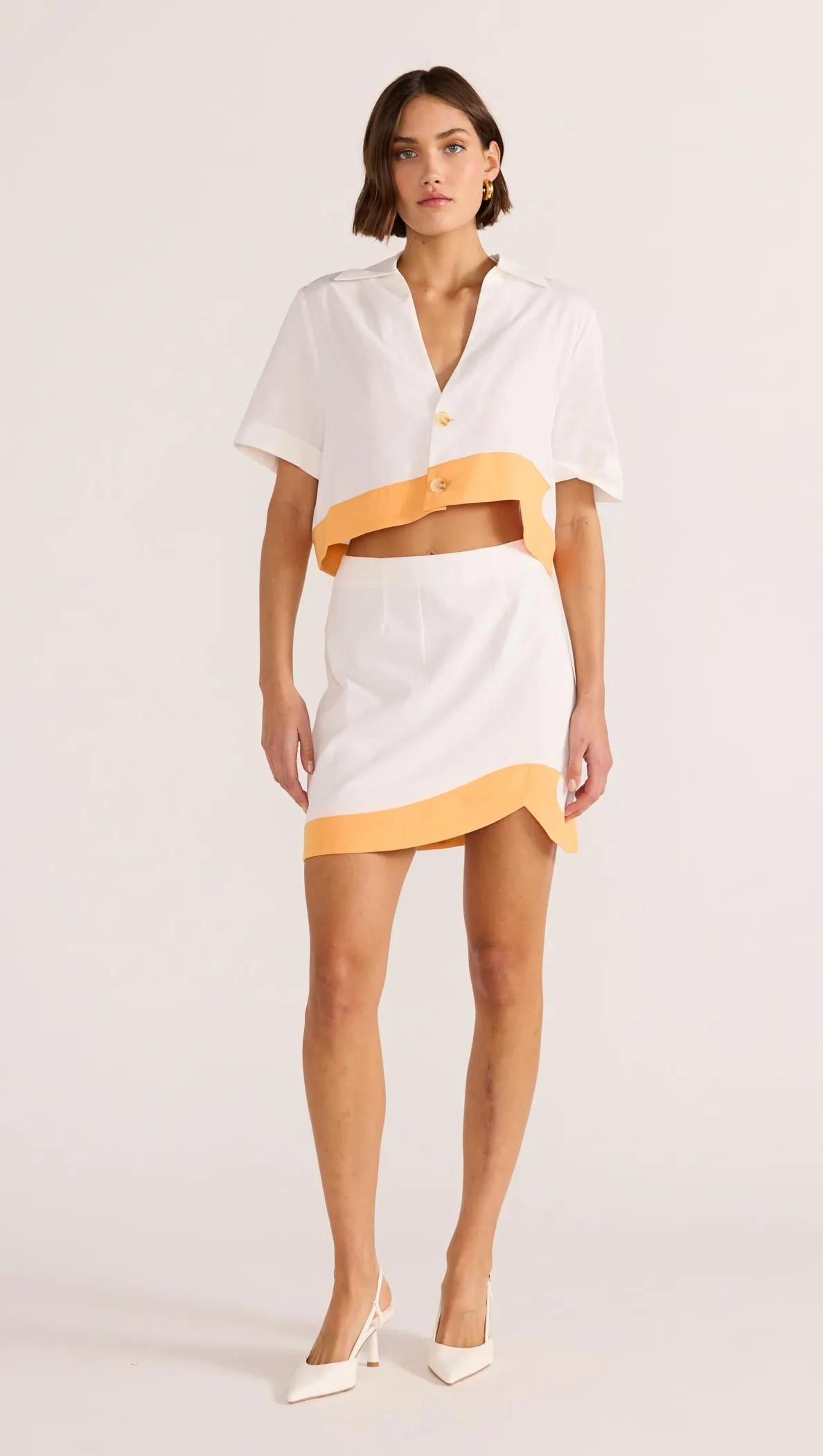 Alora Wave Mini Skirt sold by MINKPINK