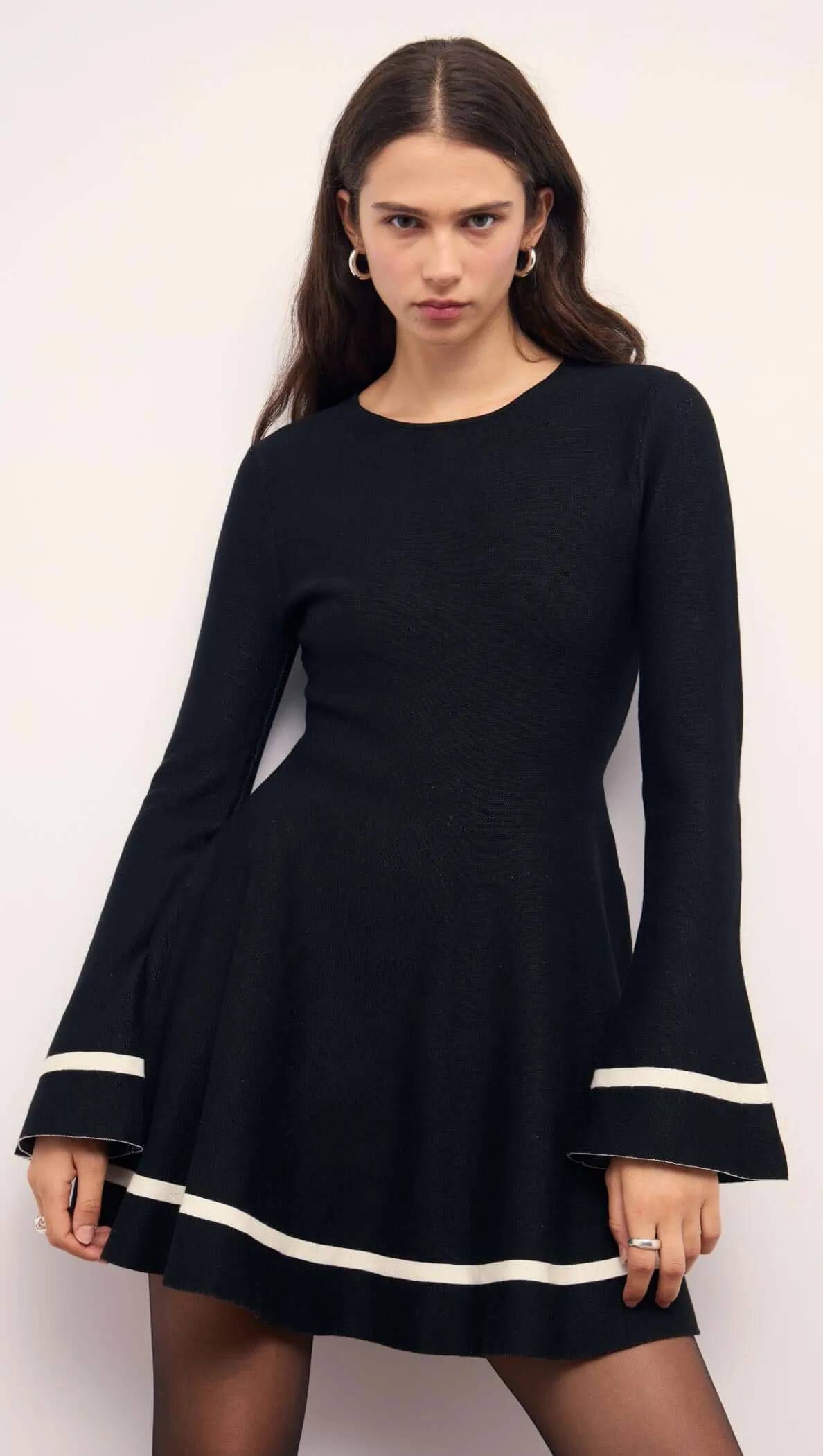 Black Peplum Knit Mini Dress With Contract Trim sold by MINKPINK