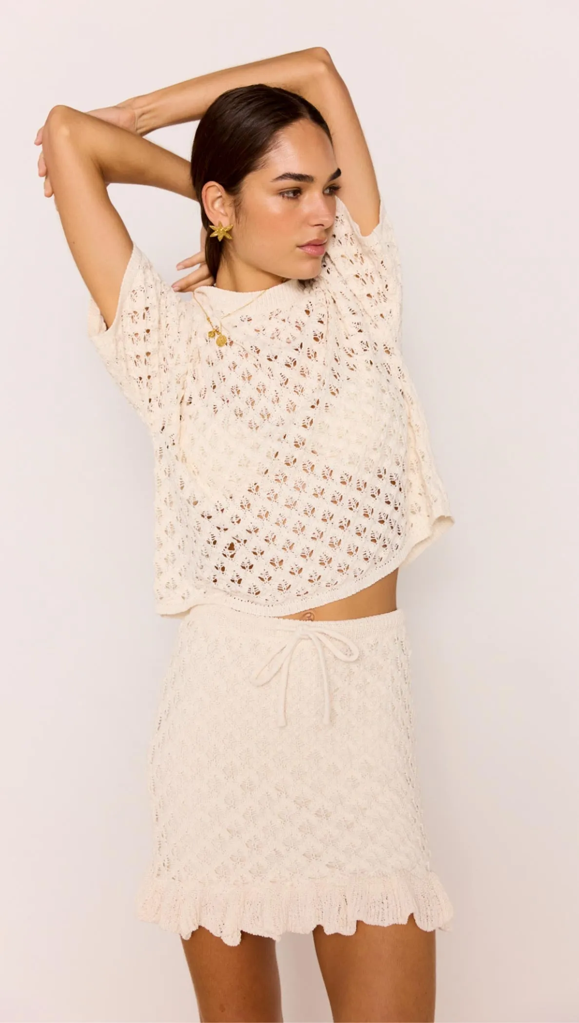 White Pointelle Knit Mini Skirt sold by MINKPINK