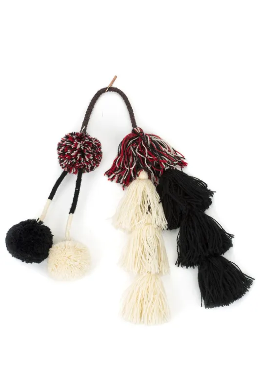 Flavia Pompom Tassel sold by Misa Los Angeles