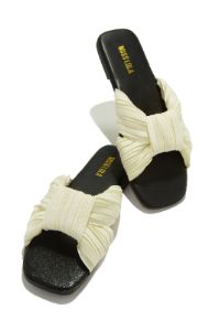 Bali Getaway - Cream sold by Miss Lola