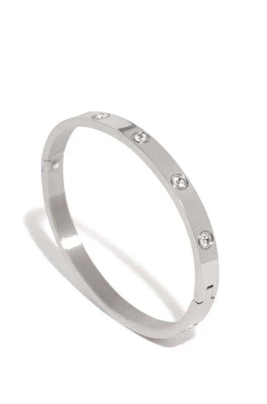 Jackie Rhodium Plated Stainless Steel CZ Bangle - Silver sold by Miss Lola