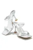 Kyazi Mule Heels - Silver sold by Miss Lola