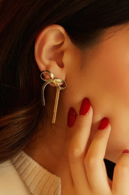 Cari Bow Tie Statement Earring - Gold sold by Miss Lola