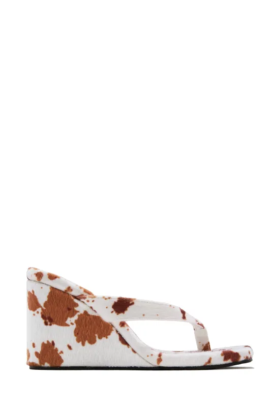 Sashelle Slip On Wedge Heels - Cow sold by Miss Lola